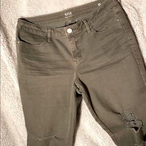 Olive skinny distressed jeans